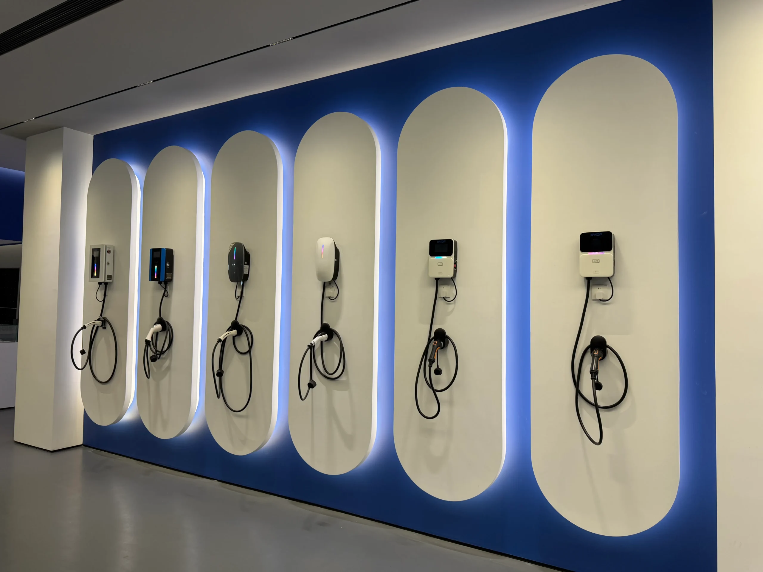 EV charger product display wall showing the breadth of AC charging models